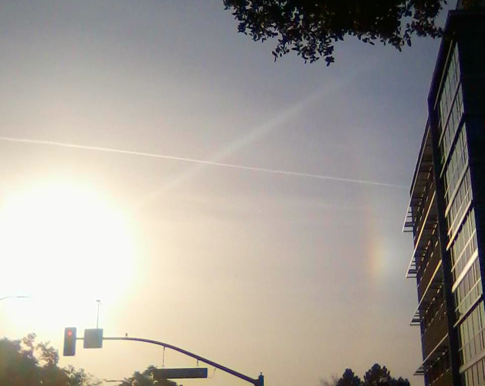It was so hard to capture this rainbow. Sorry you can barely see it. =(
