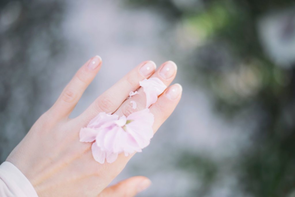 flower on fingers