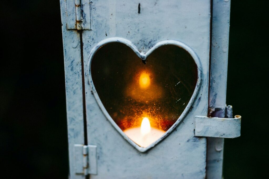 candle in a heart lantern -- spiritual writer